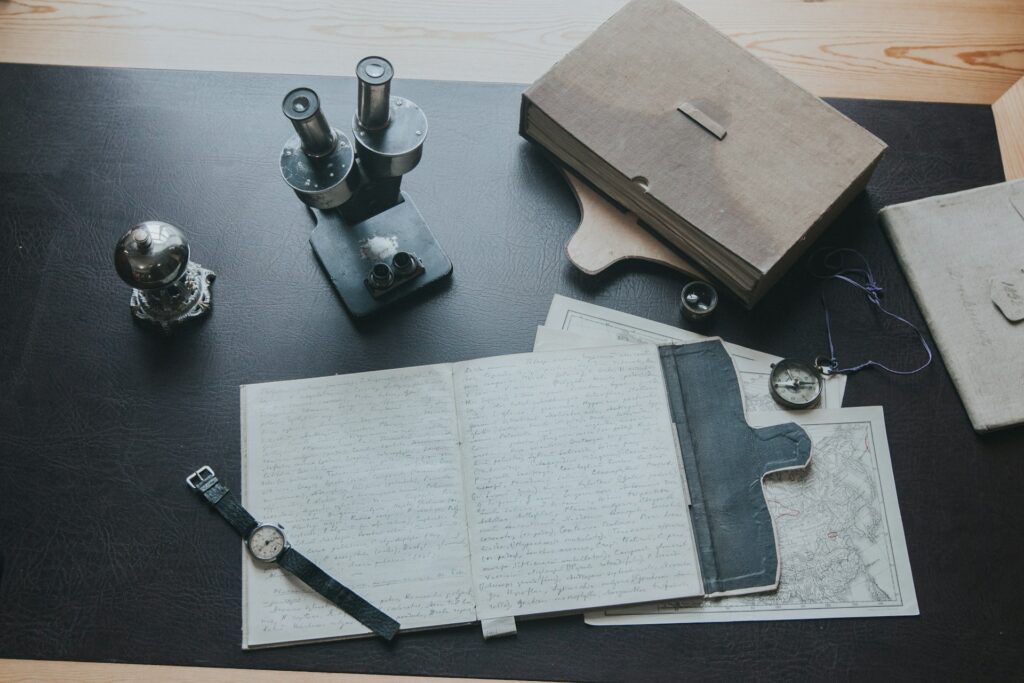 A science kit featuring a microscope, test tubes, and other tools for hands-on experiments.